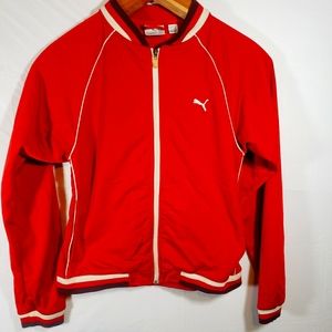 Vintage puma track jacket size large. Burnt red color with white zipper.